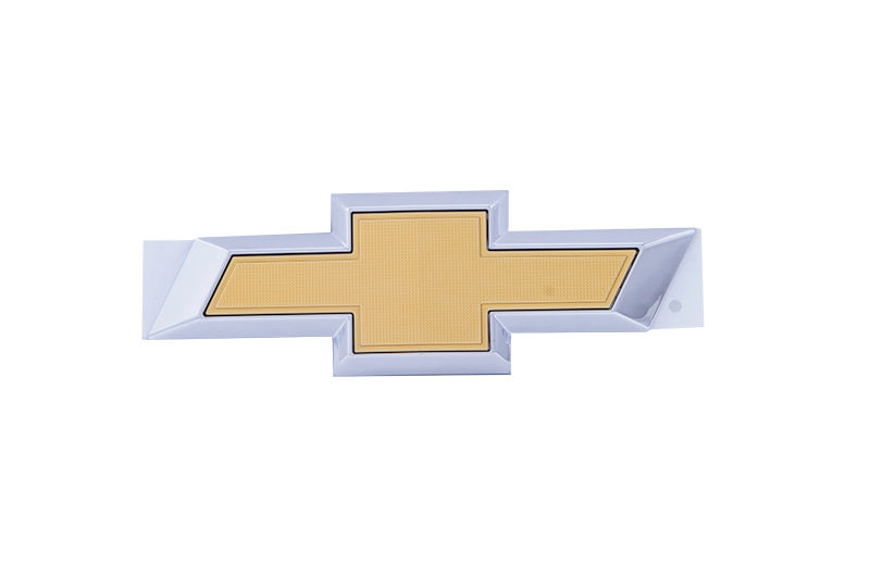 Emblema tampa traseira - 52101538 - Prisma/Joy Plus, Prisma B