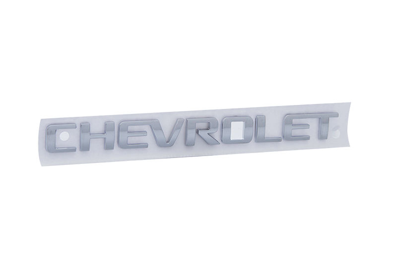 Emblema tampa traseira - 94716504 - Agile, Meriva, Corsa A Hatch
