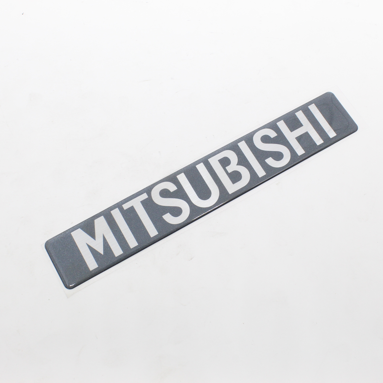 EMBLEMA, MITSUBISHI MOLDURA PO - CA510199 - 