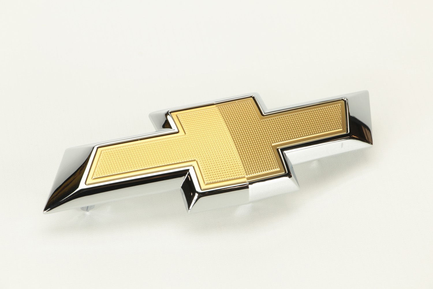 Emblema grade dianteira - 23382552 - Cruze B Hatch, Cruze B Sedan, Cruze Ger.2 Hatch
