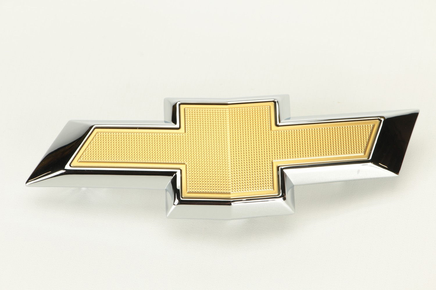 Emblema grade dianteira - 23382552 - Cruze B Hatch, Cruze B Sedan, Cruze Ger.2 Hatch